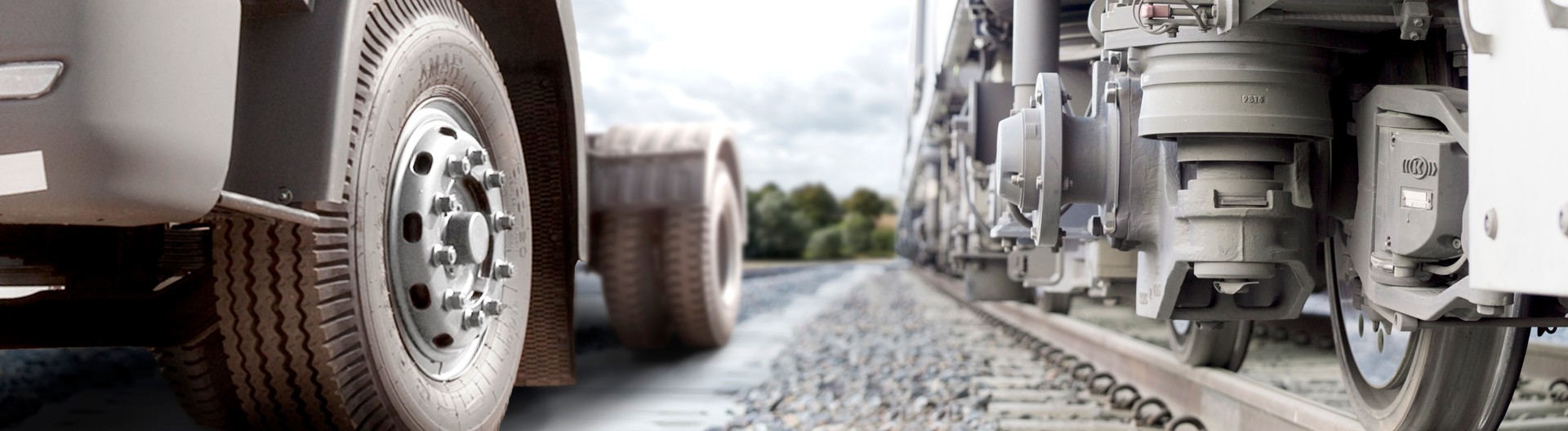 Vehicles of a truck and vehicle of a train facing each other