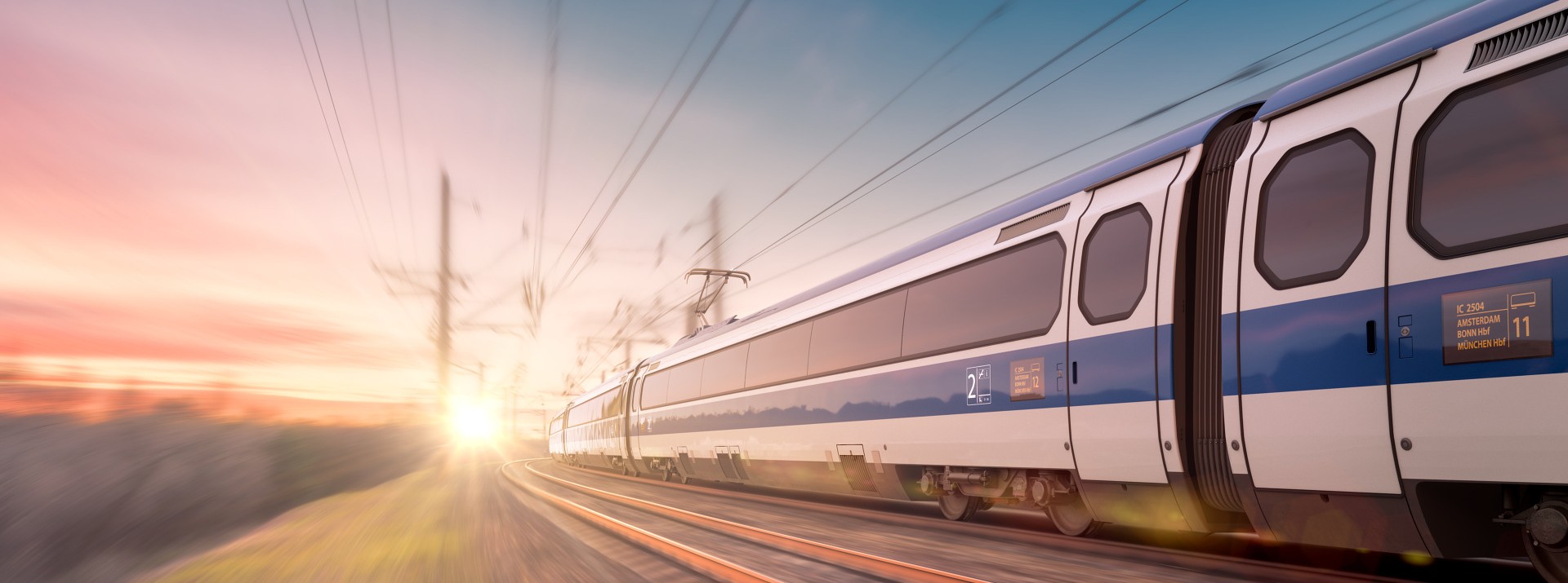 High-speed train traveling on railway tracks at