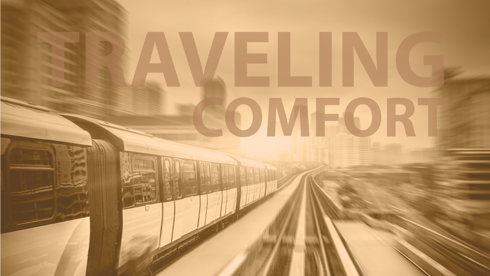 Train traveling through urban landscape, conveying comfort.